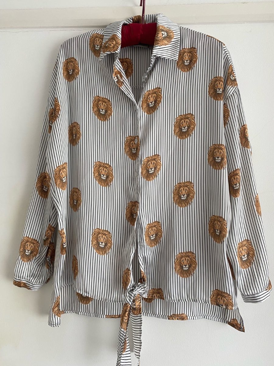 Striped tie front shirt with lion head design size 10