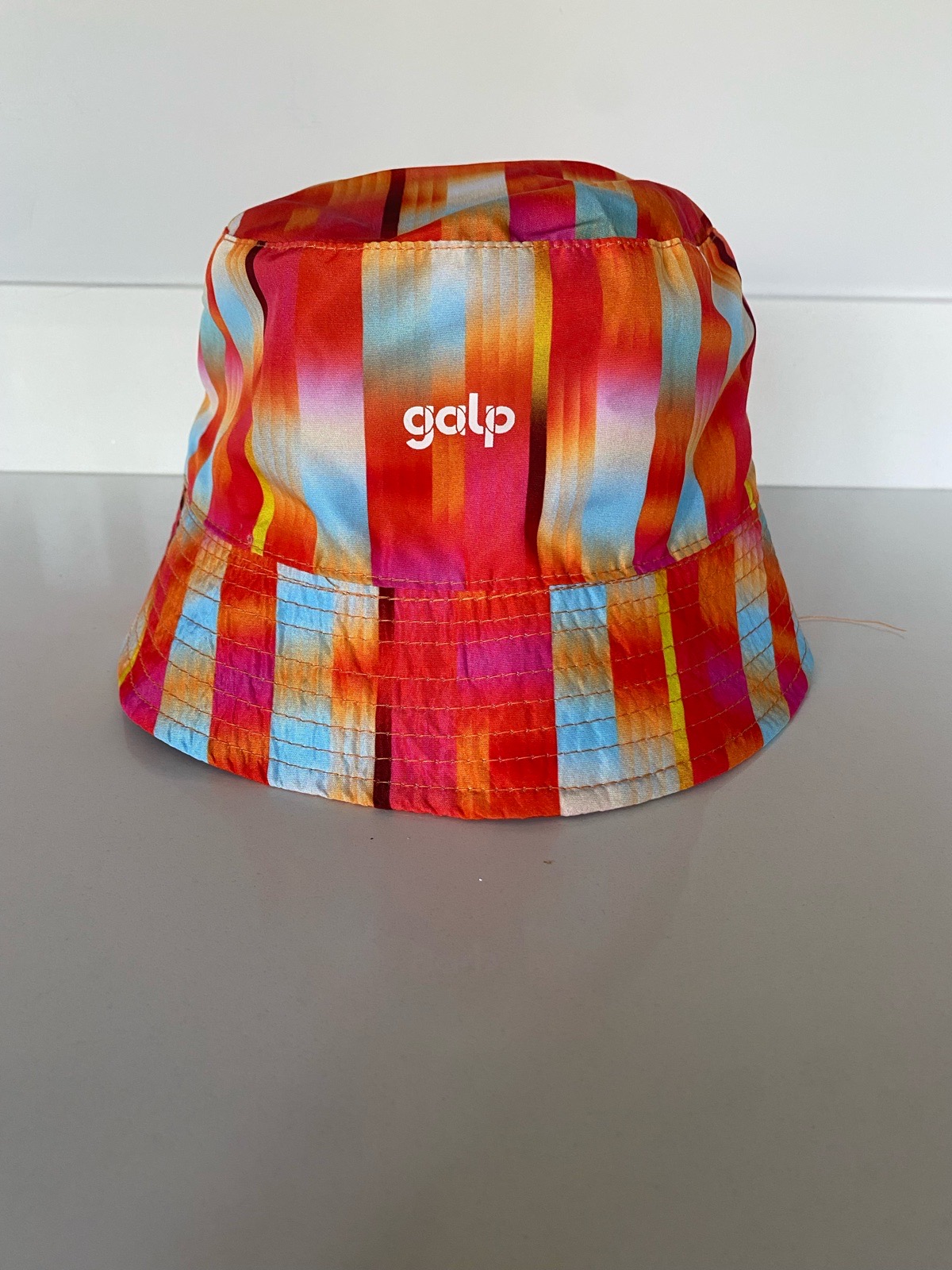 New Reversible Galp Bucket hat in orange red and blue pattern /plain orange metallic