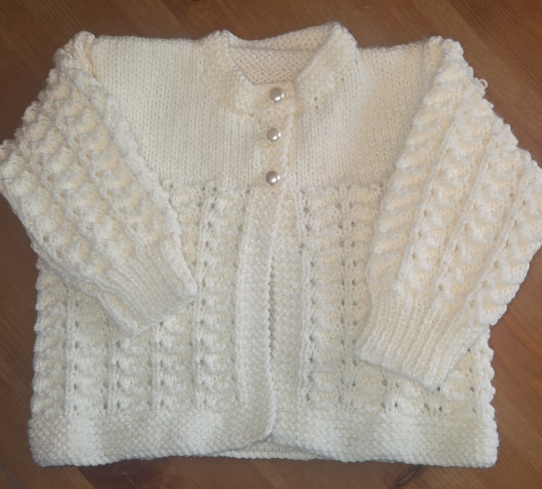 Hand knitted matinee coat