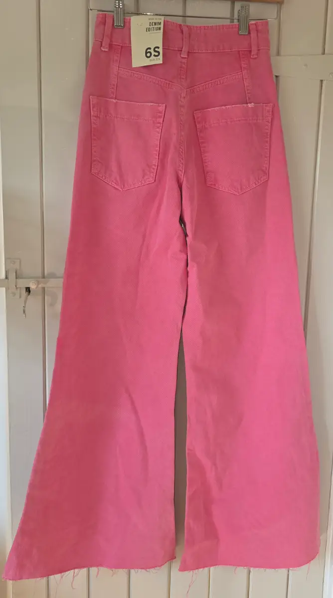 River Island. High waisted, wide leg jeans. Bright pink. UK 6 (Premium Fit)