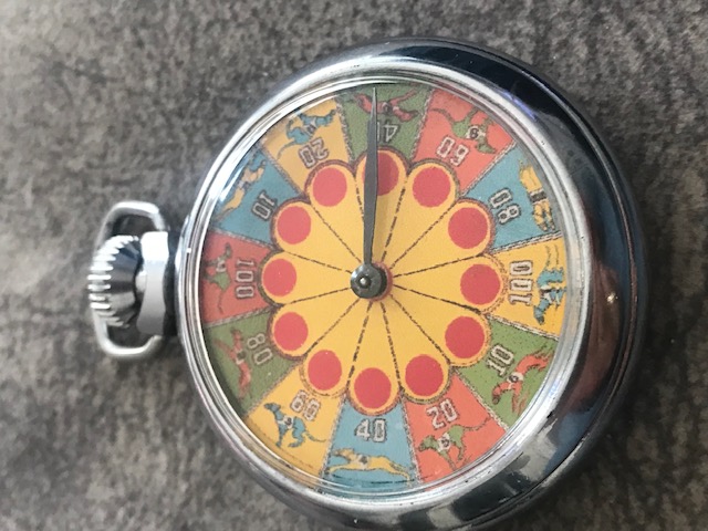 Vintage Greyhound dog pocket clockwork gambling game