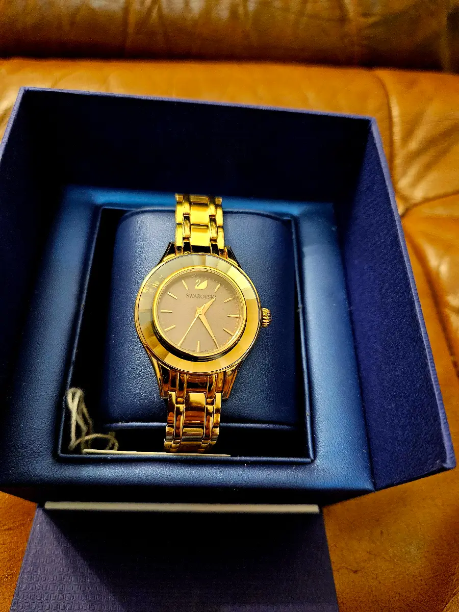 Swarovski gold ladies watch