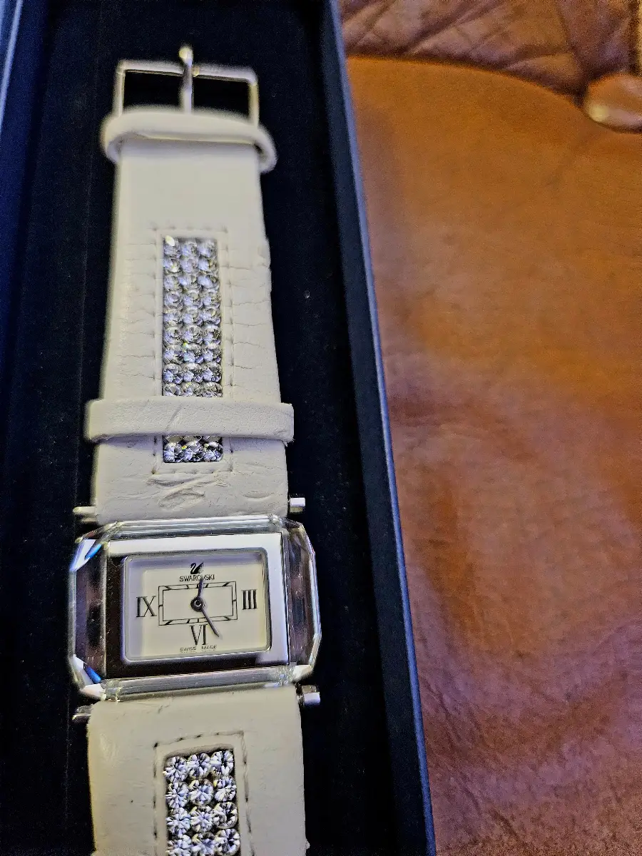 Swarovski white strap ladies watch