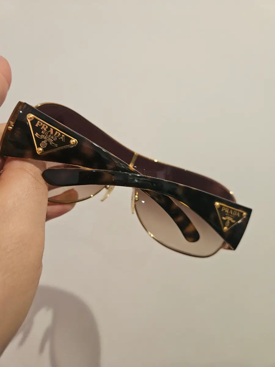 Prada tortoise brown gold sunglasses