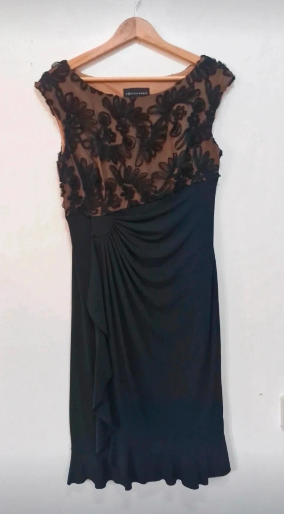 Connected apparel ladies   size 10 black dress with black mesh lace detailing with beige back colo