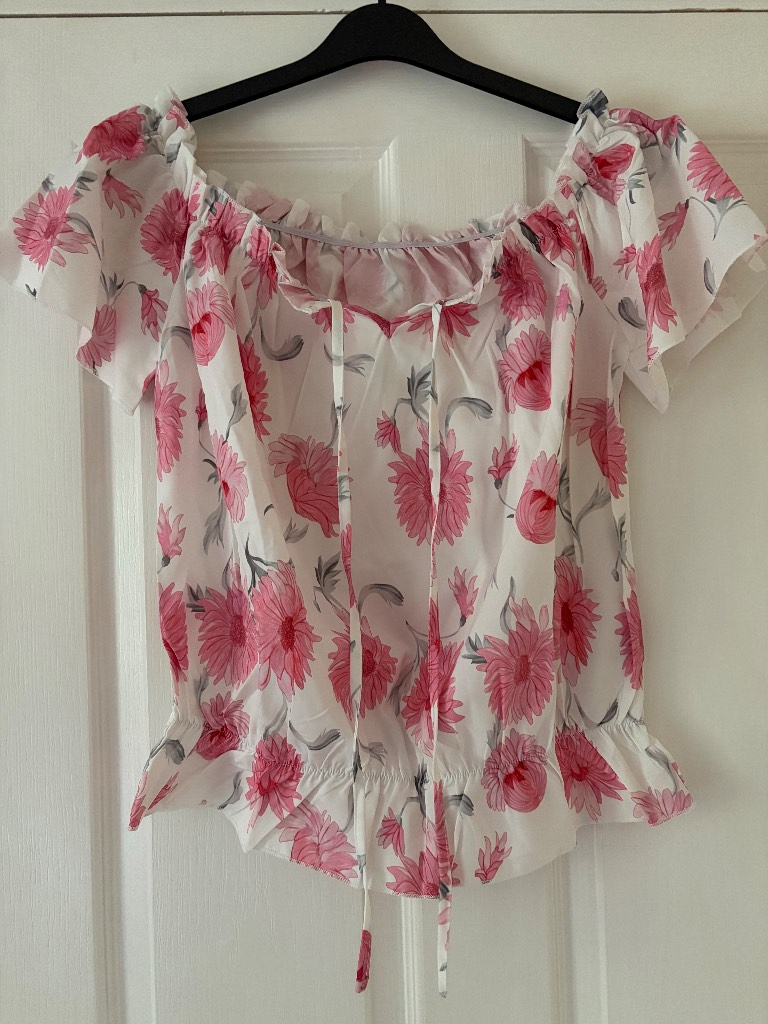 White and pink top