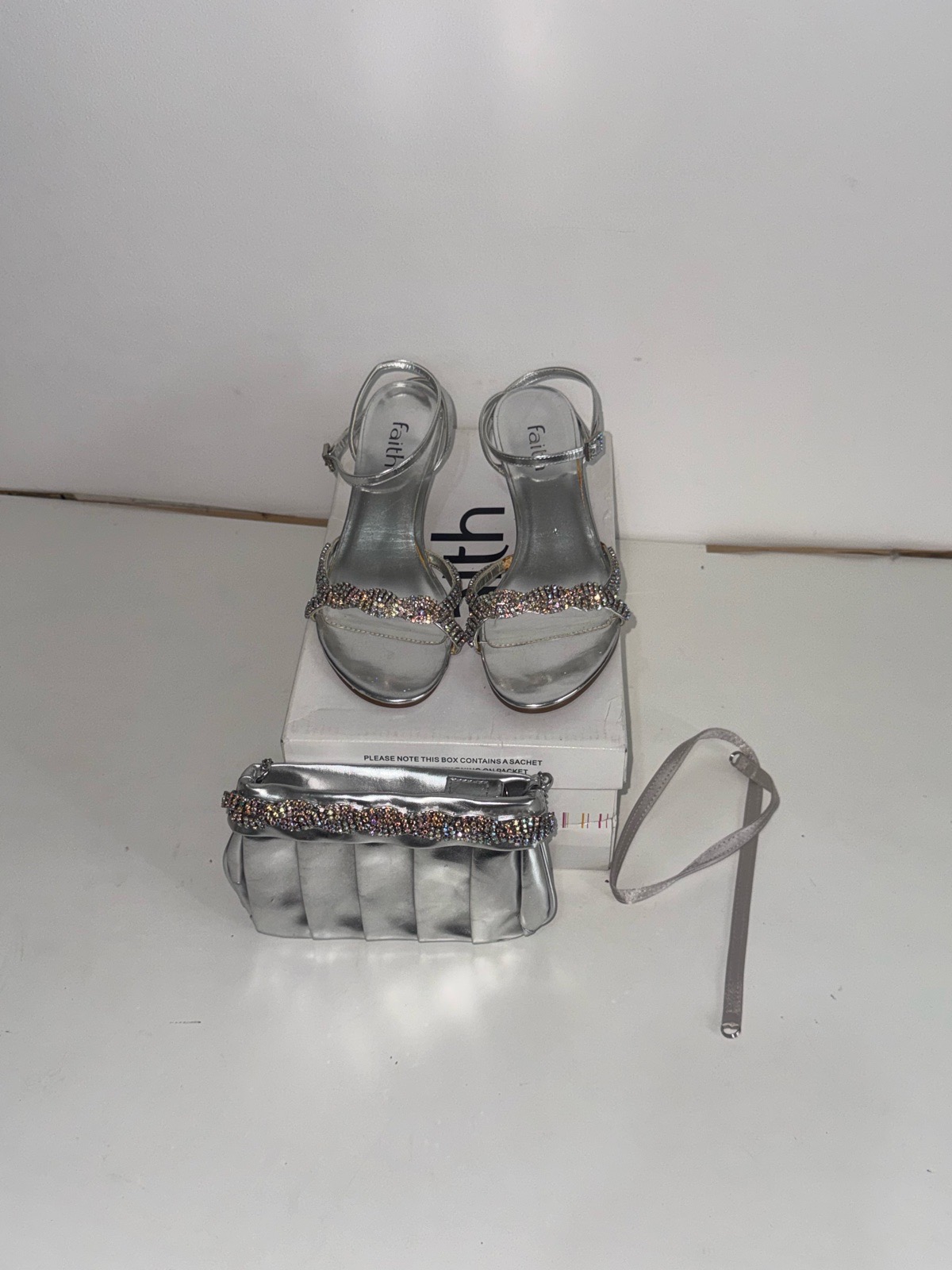 Silver Faith sandal and clutch set with rhinestone embellishments #glamour #party