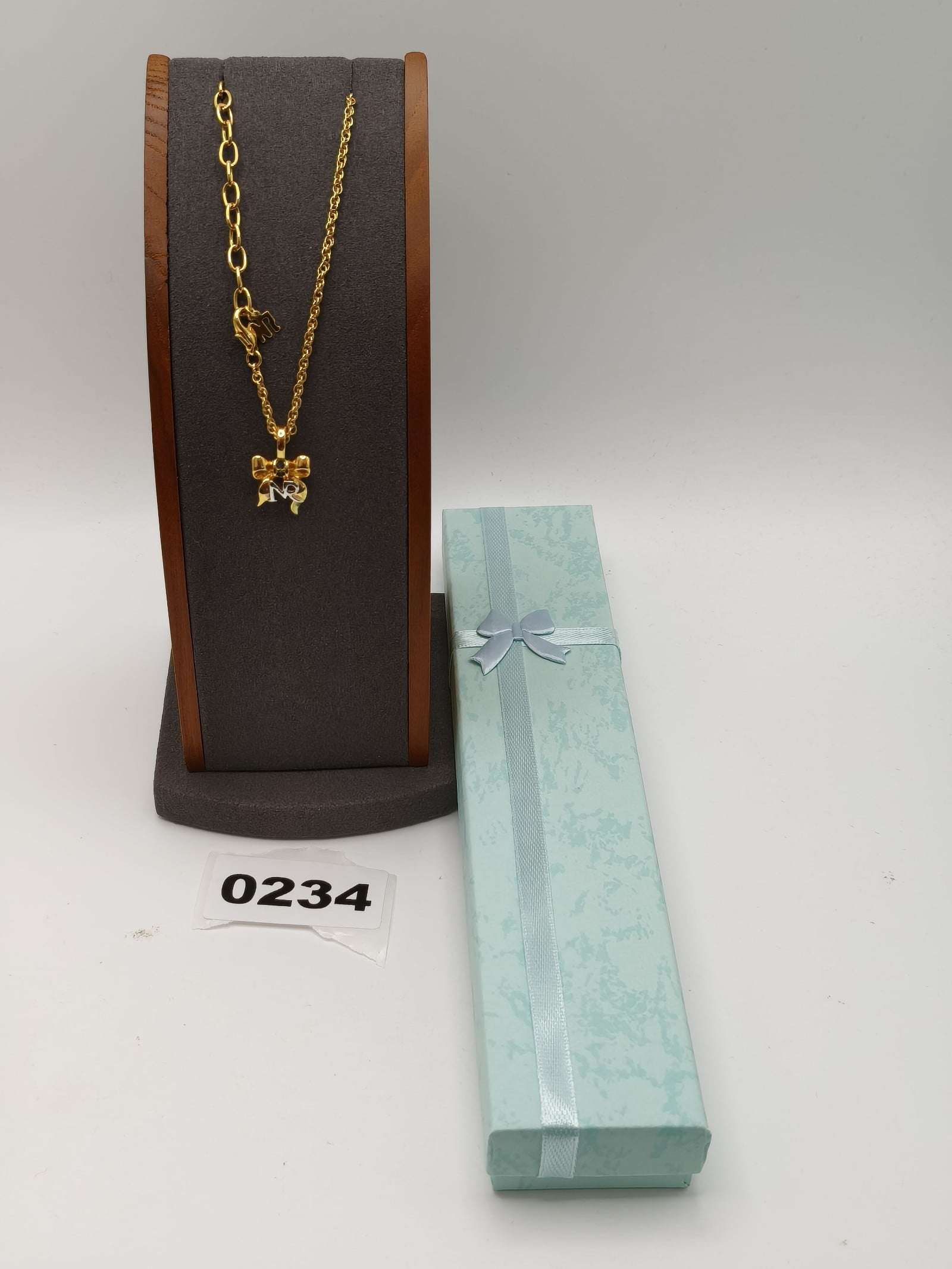 Nina Ricci NR Women's Gold Tone Bow Necklace 7.5 in Blue Detail