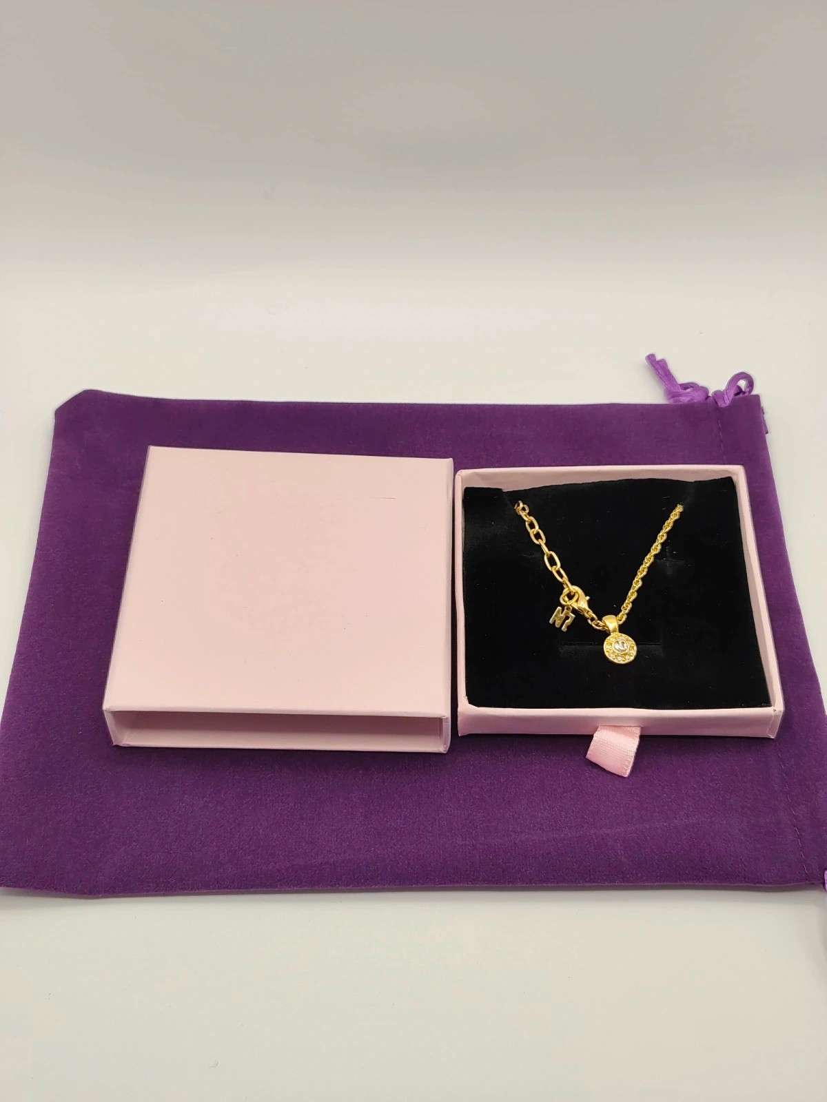 Vintage Nina Ricci Crystal Round Pendant Necklace Gold and Silver Two Tone NR Logo