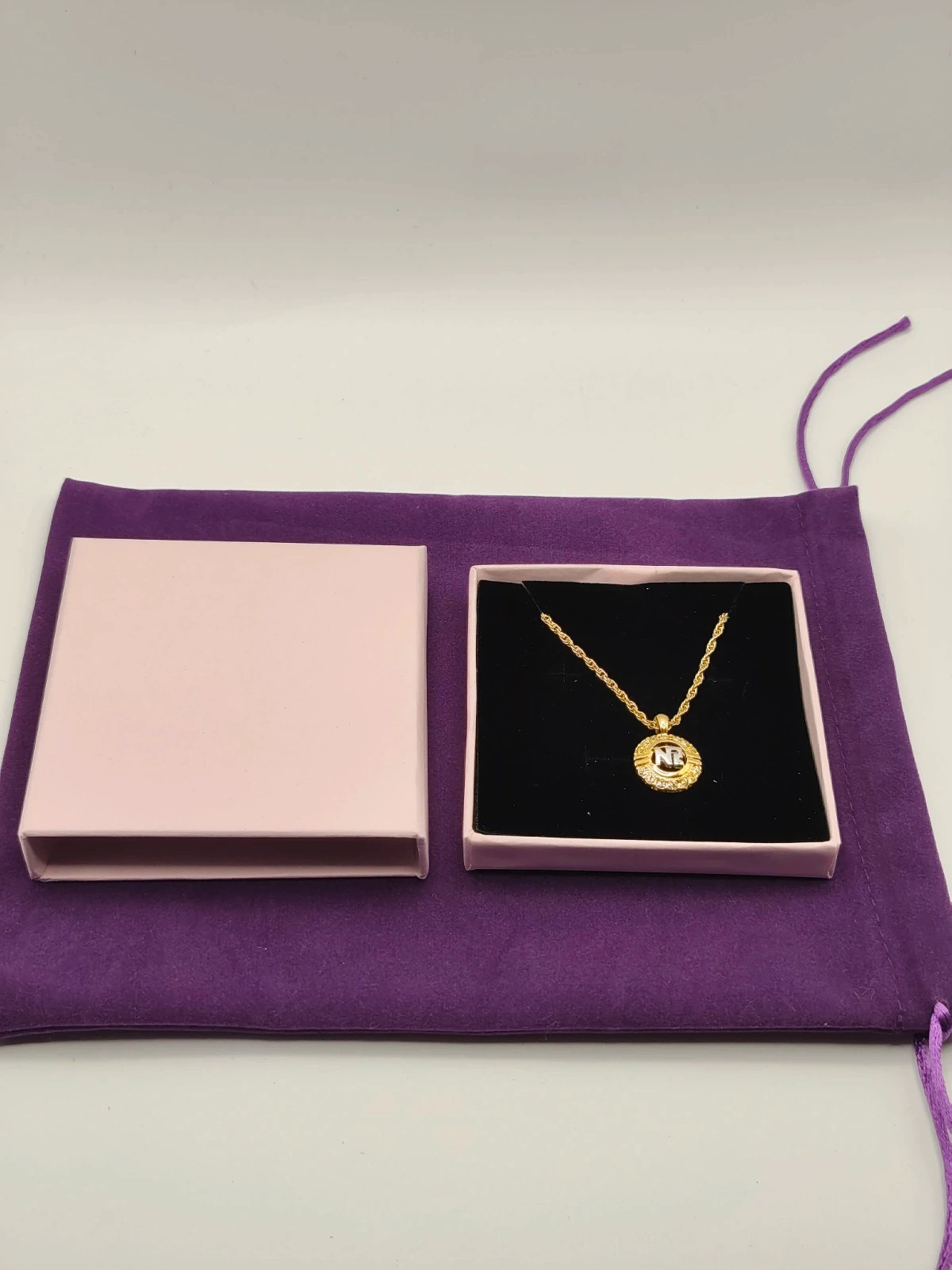 Vintage Nina Ricci Gold Plated Crystal NR Logo Pendant Necklace and Pouch