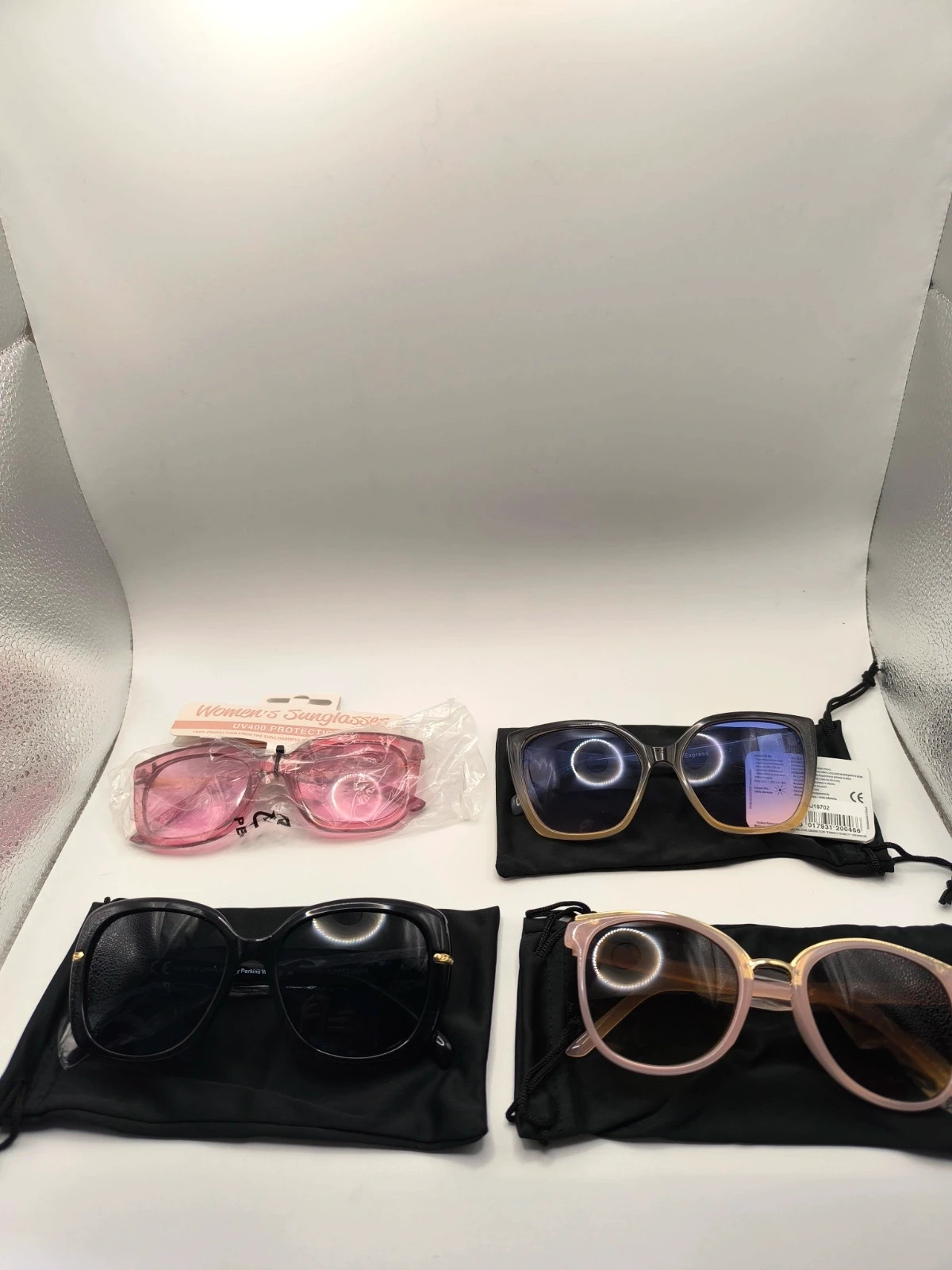 Bundle of 4 pairs of brand new womens sunglasses