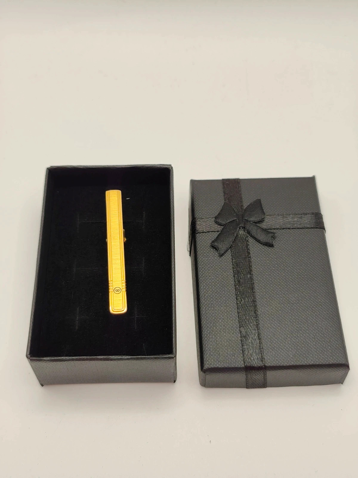 Bally vintage gold tone tie clip