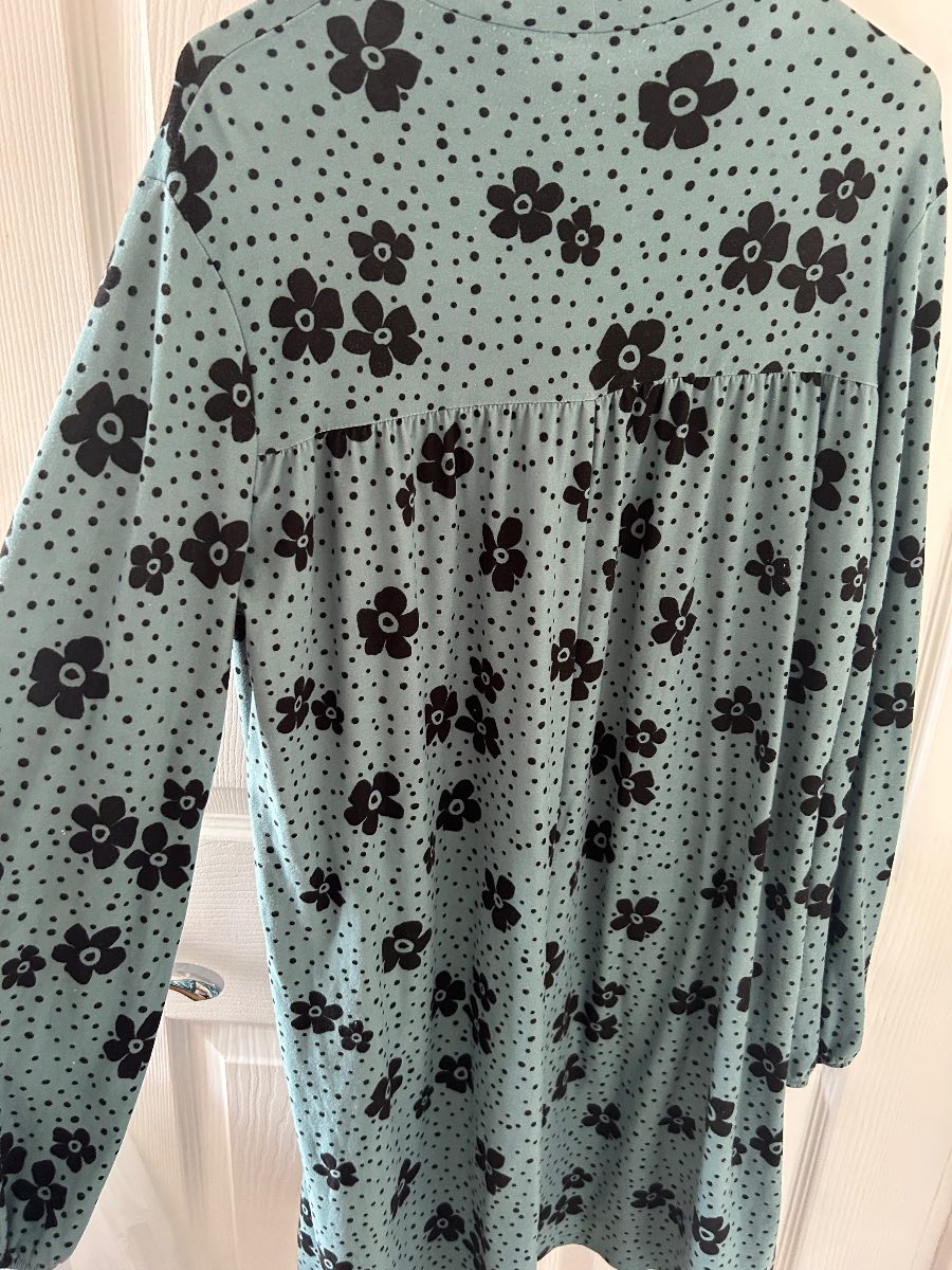 Blue dress with black patterns