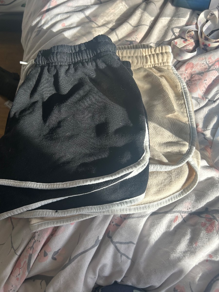 2x black and cream shorts