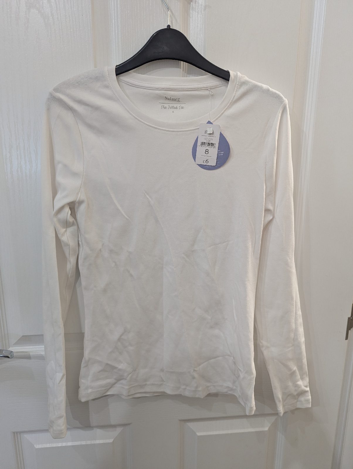 Long sleeved white fitted top