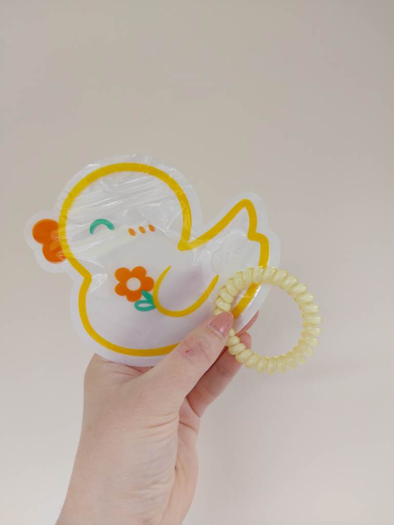 Small yellow elastic spiral style bracelet with cute duck gift pouch