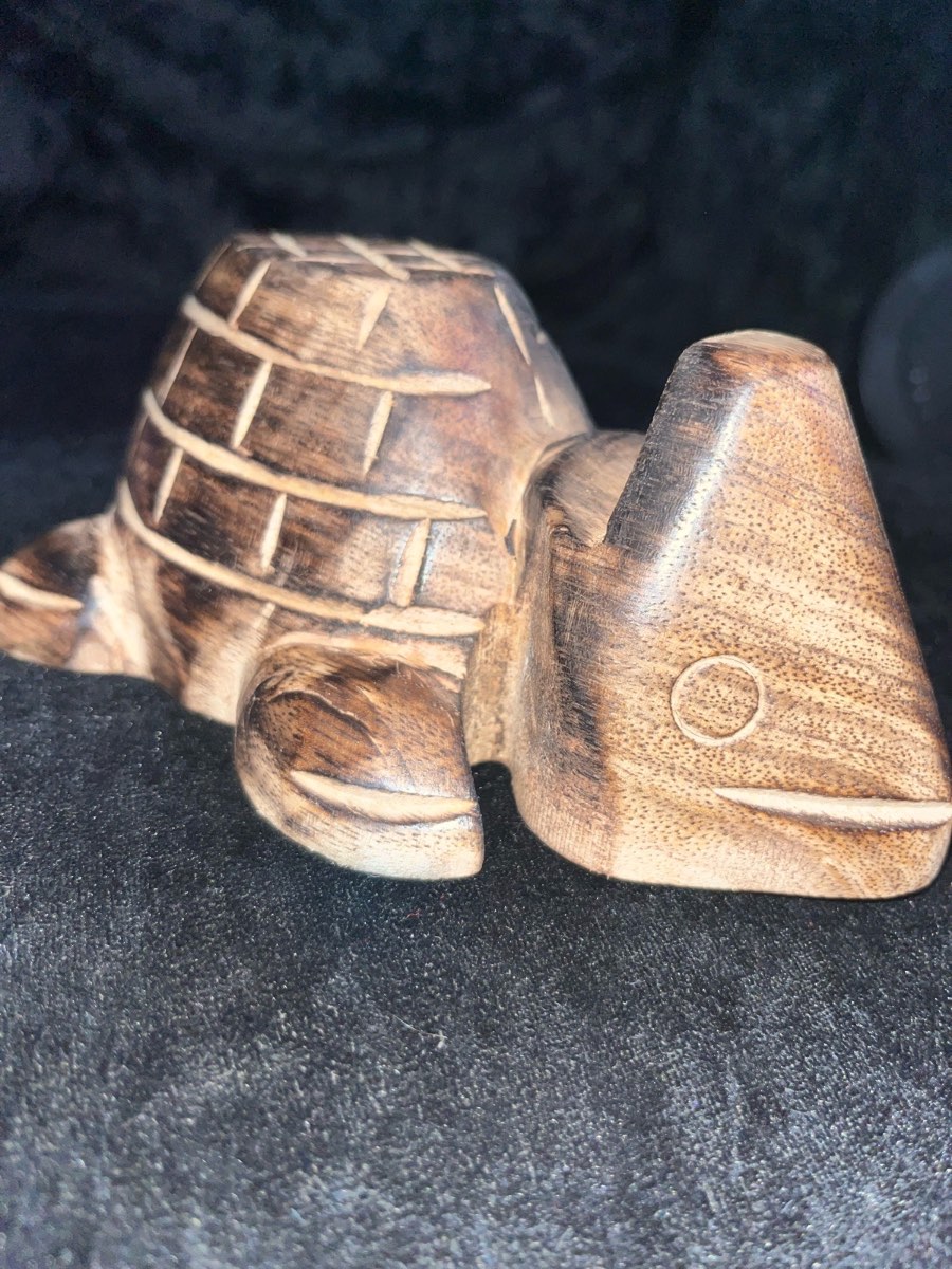 Carved wooden turtle glasses holder