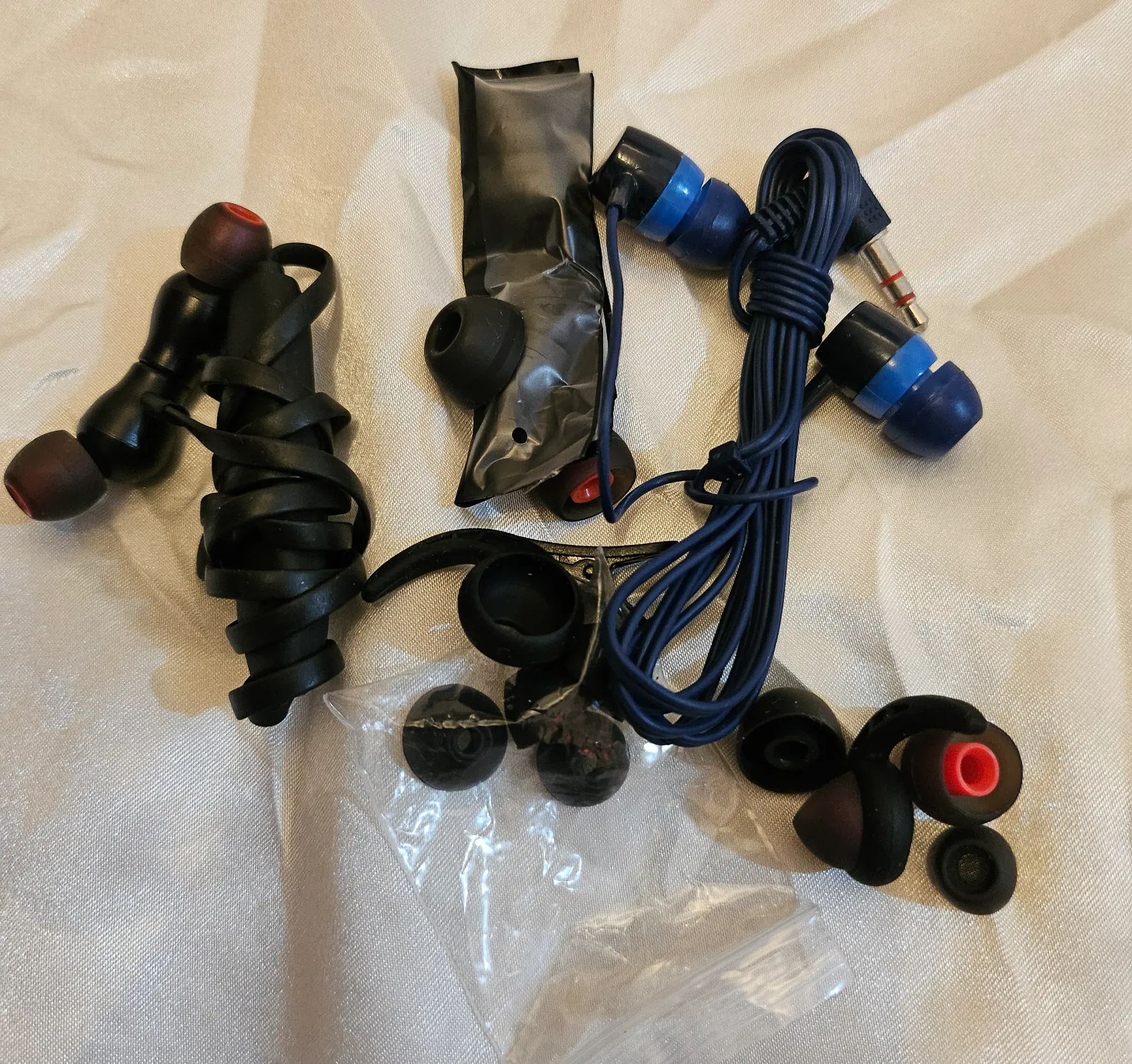 Mix of headphones and bud covers