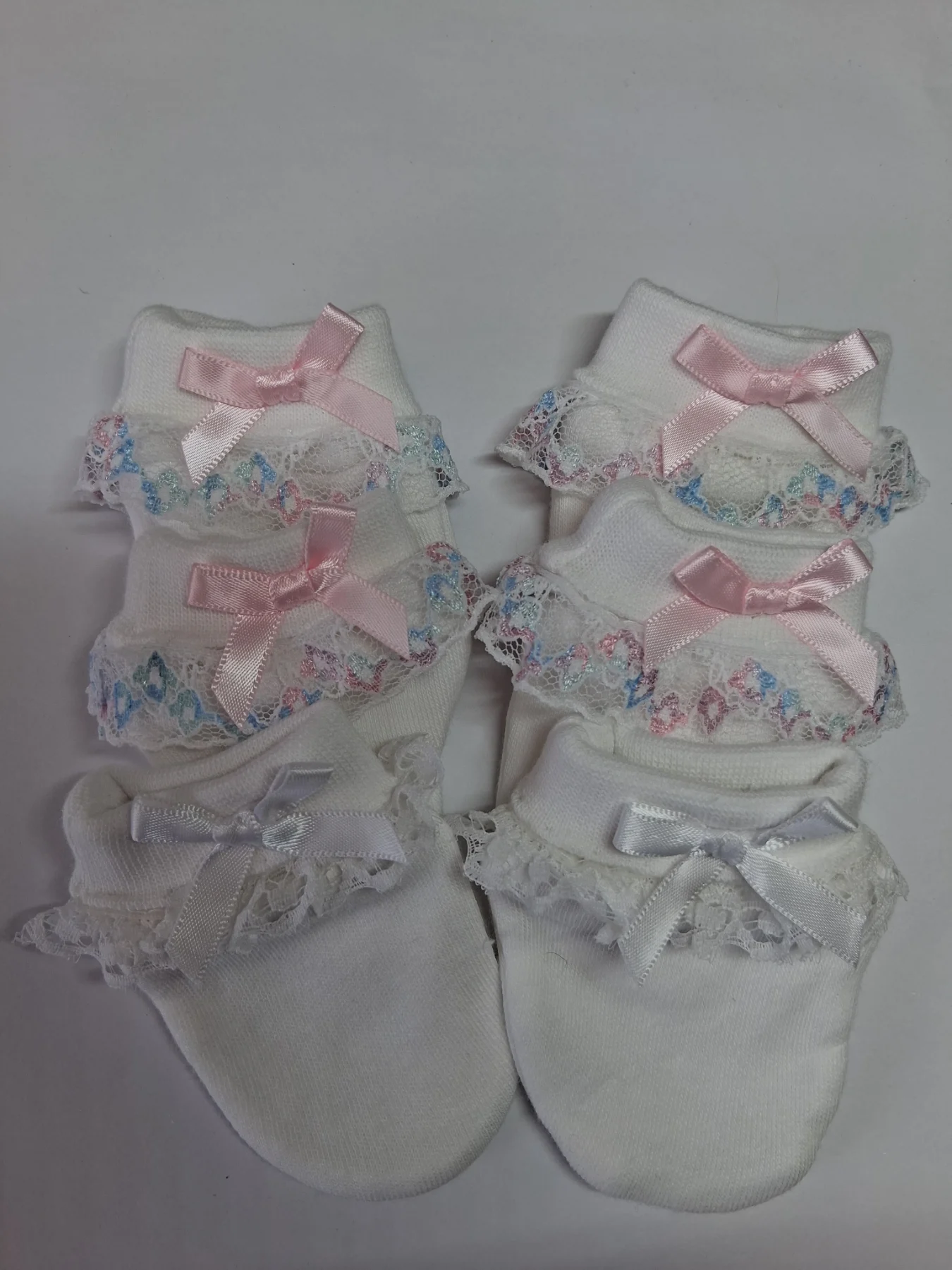 3 pairs of white anti scratch mittens size newborn