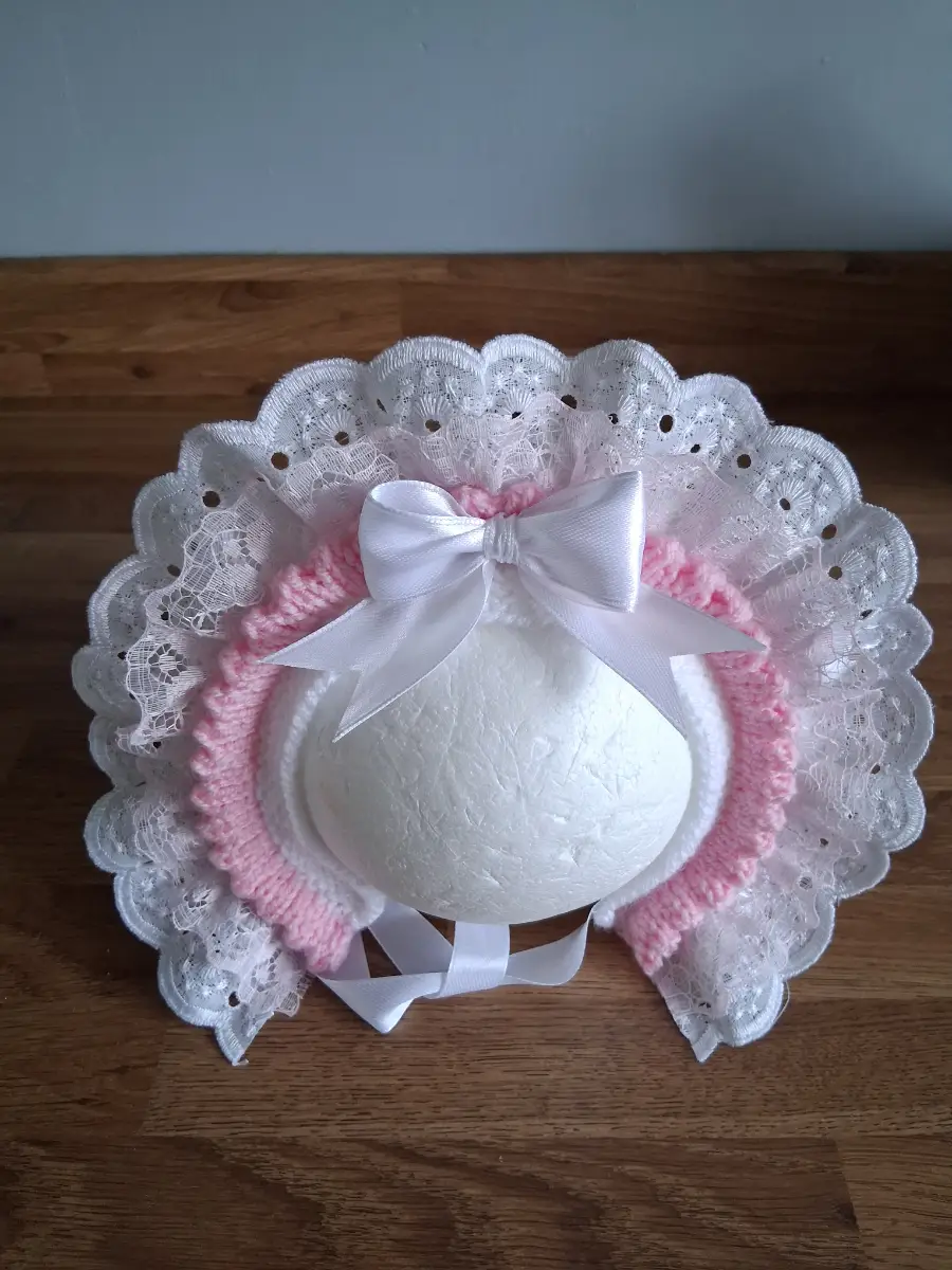 Knitted baby girls hat/bonnet size 3-6months
