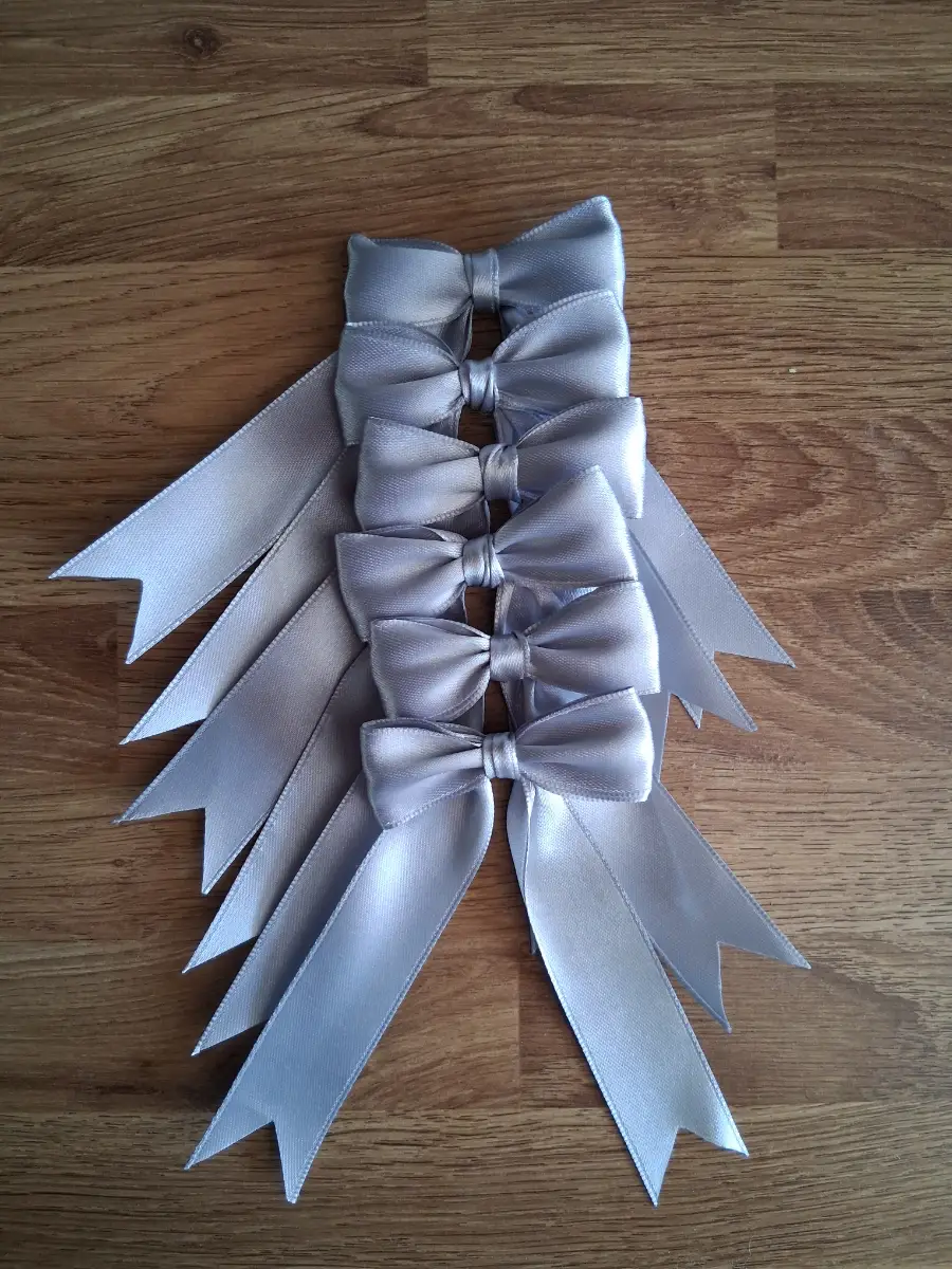 12 silver satin bows