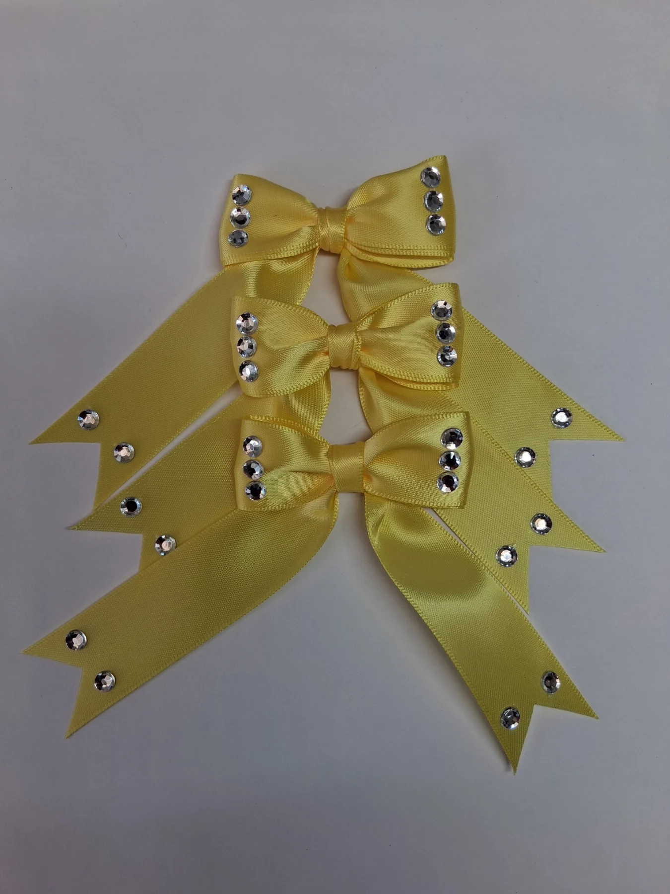 6 yellow satin bows