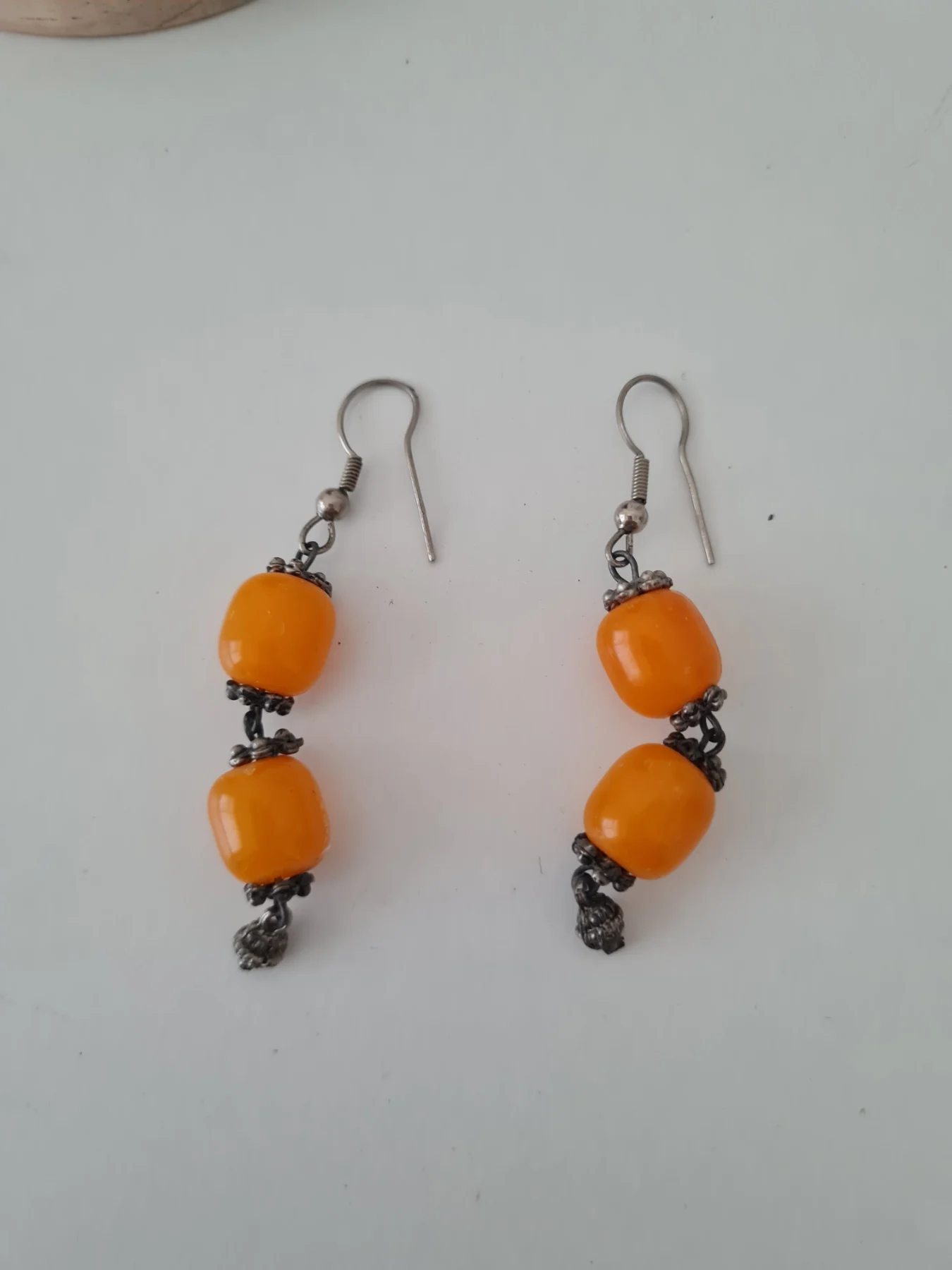 Silver tone Orange beaded dangle earrings