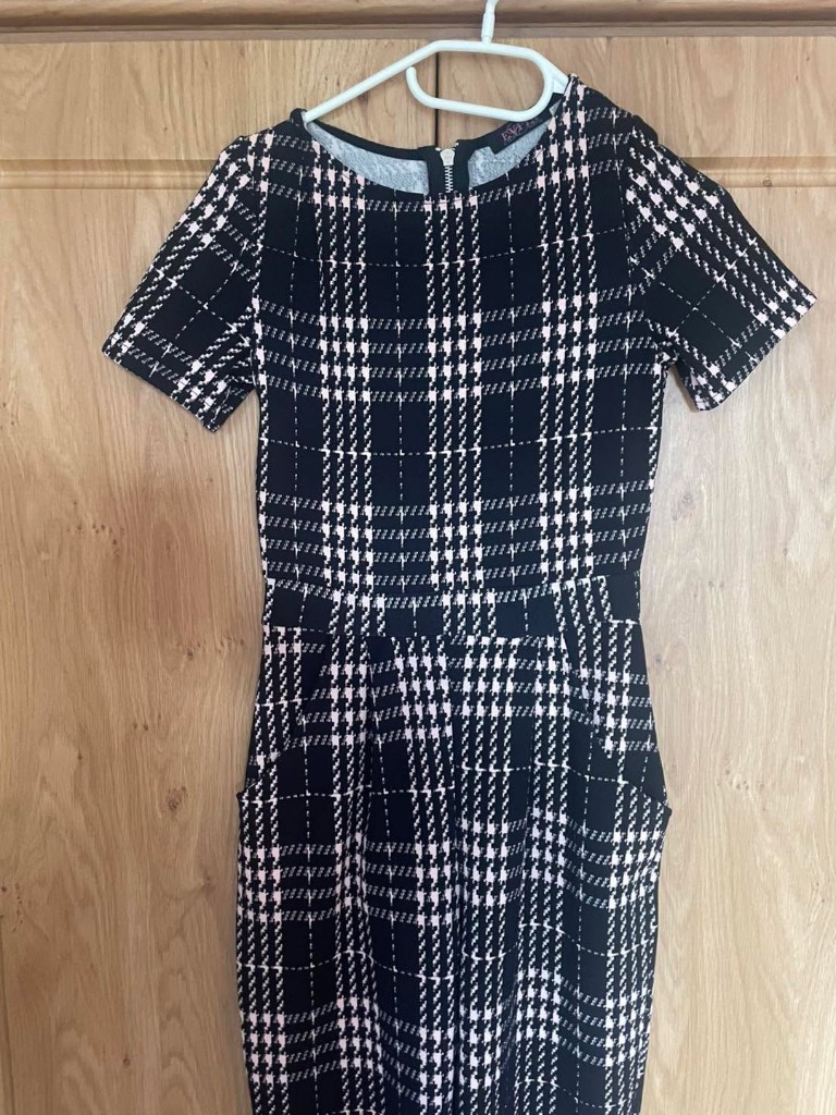 E-cut jumpsuit featuring black & plush pink check pattern size 8-10