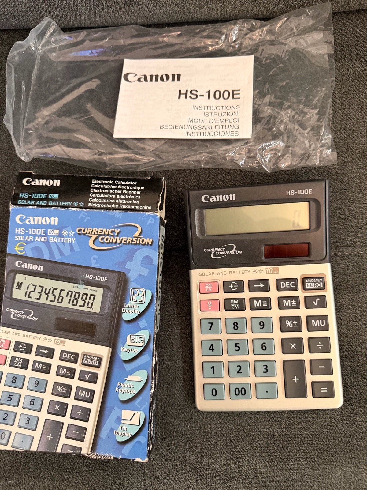 Canon HS-100E Desktop Calculator - Solar/ Battery - Currency Converter - Brand New - Damaged Box