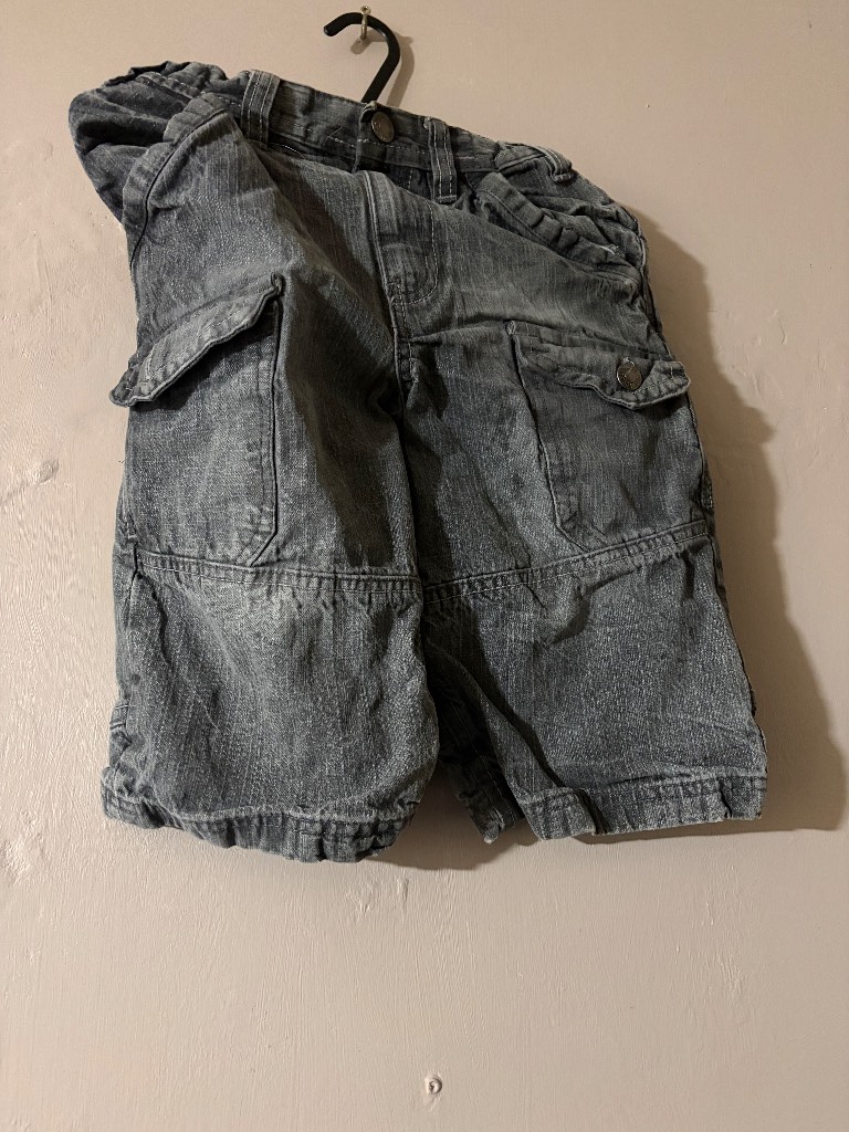 Grey denim cargo shorts in a size 6 years