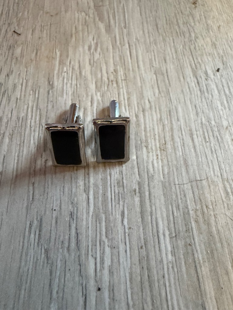 Black and silver cufflinks