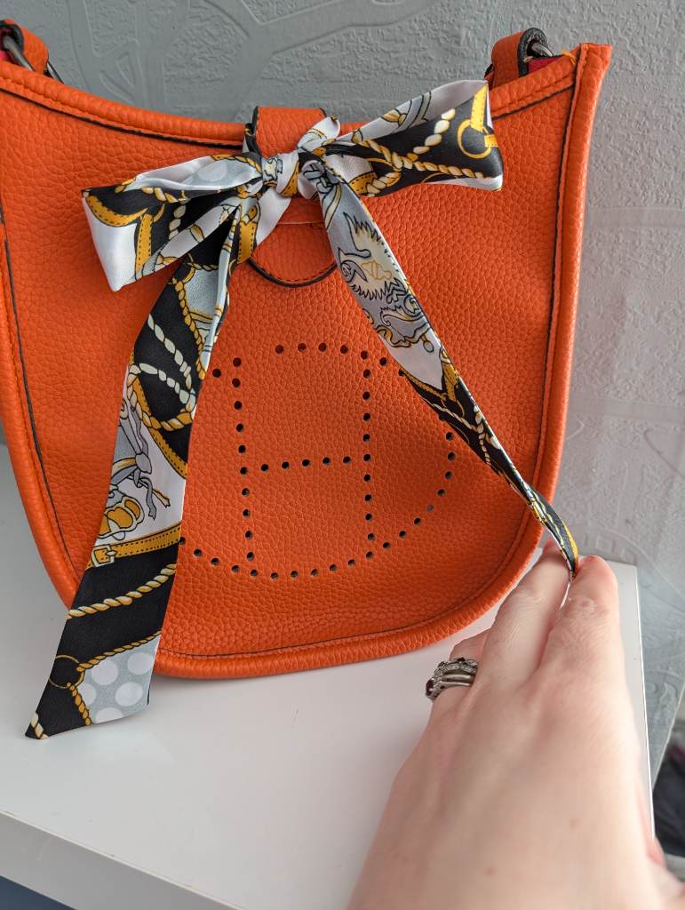 Orange shoulder bag