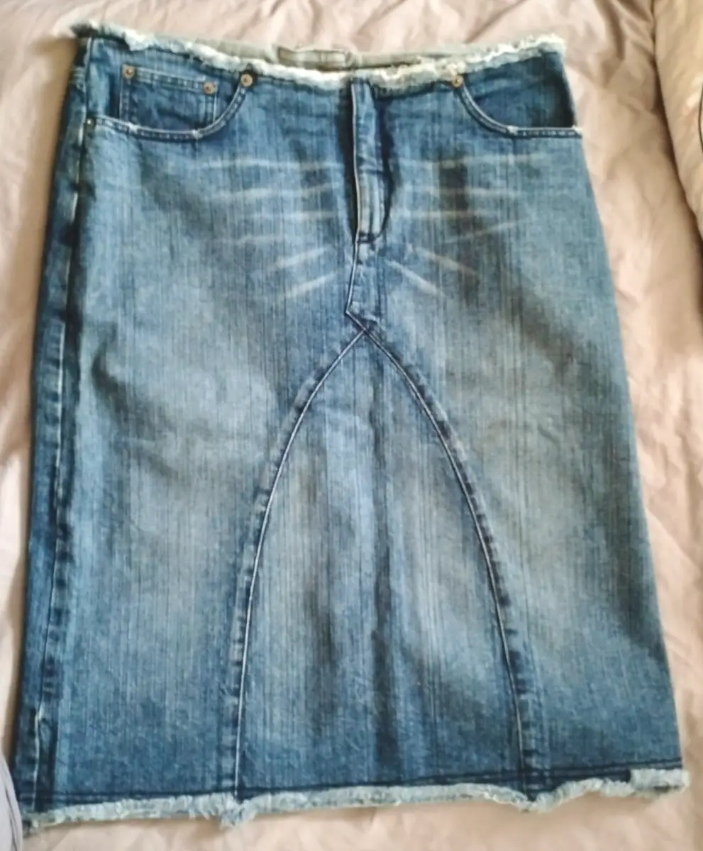 Criminal Denim blue knee length denim skirt with raw frayed hem and union jack on rear