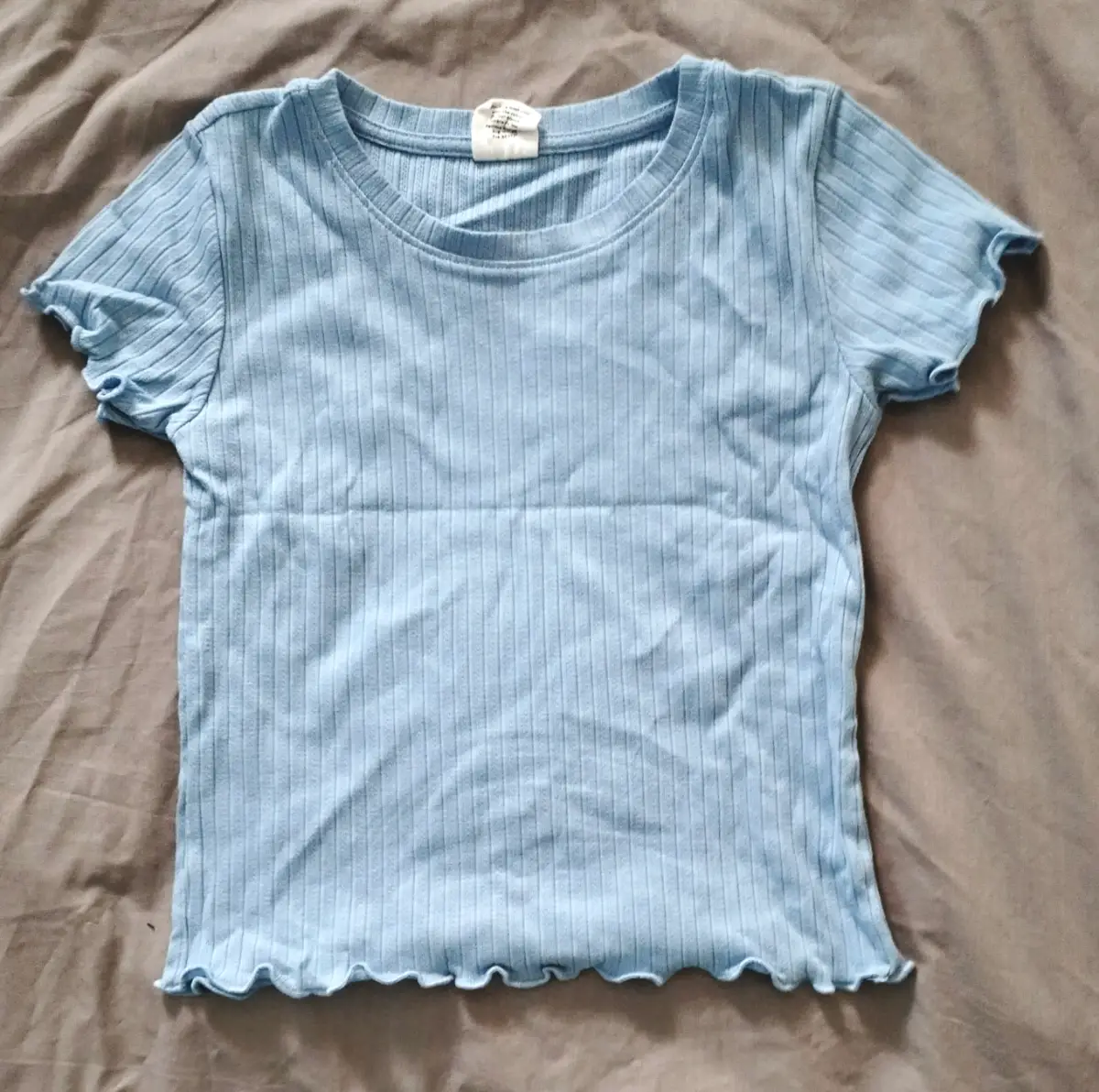 Essentials Full Tilt light blue ribbed cotton, polyester & spandex baby tee. Medium