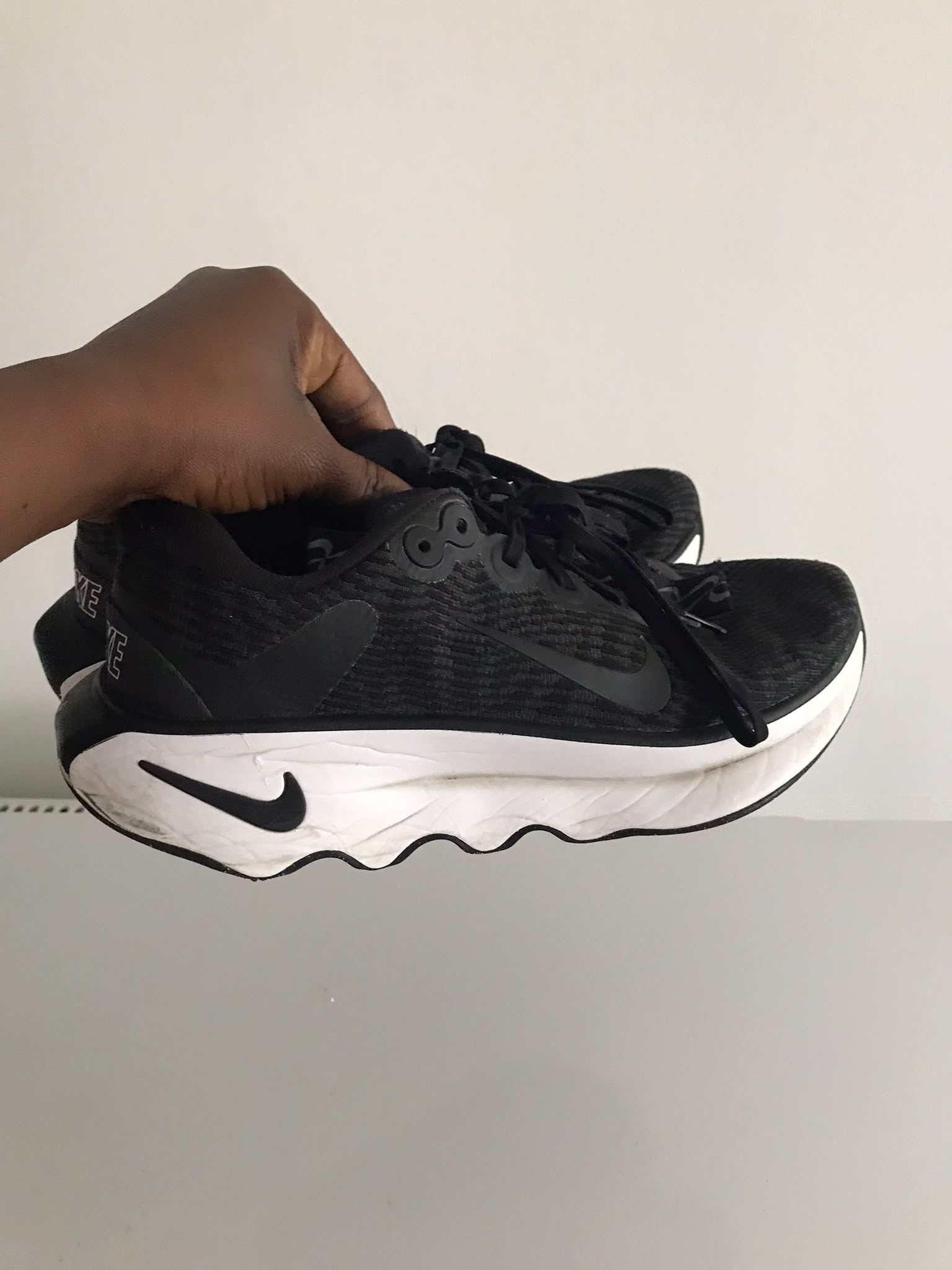 Nike Motiva walking and running shoes