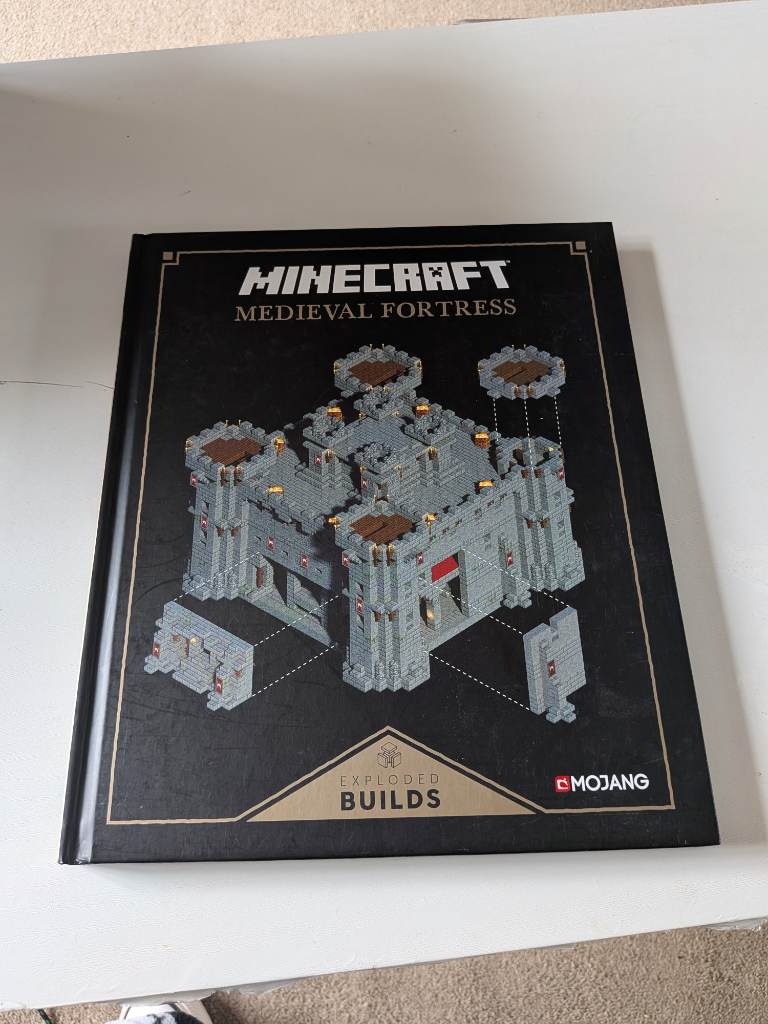 Official mojang Minecraft medieval fortress book ( how to build)