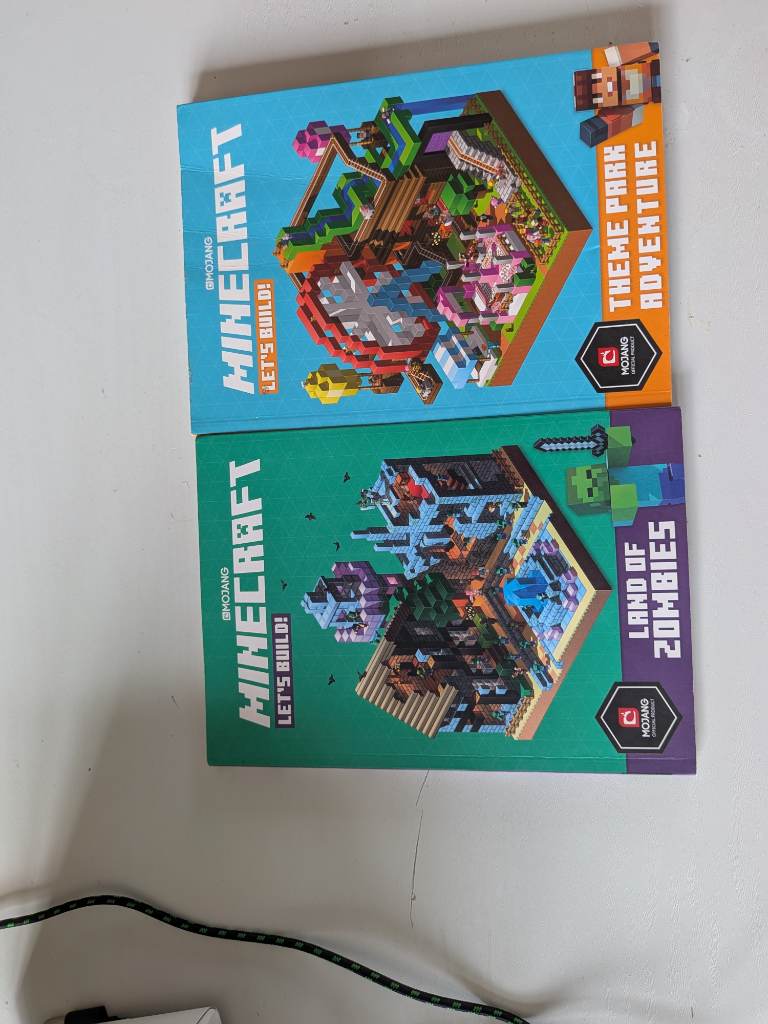 official mojang Minecraft lets build  theme park and land of zombies