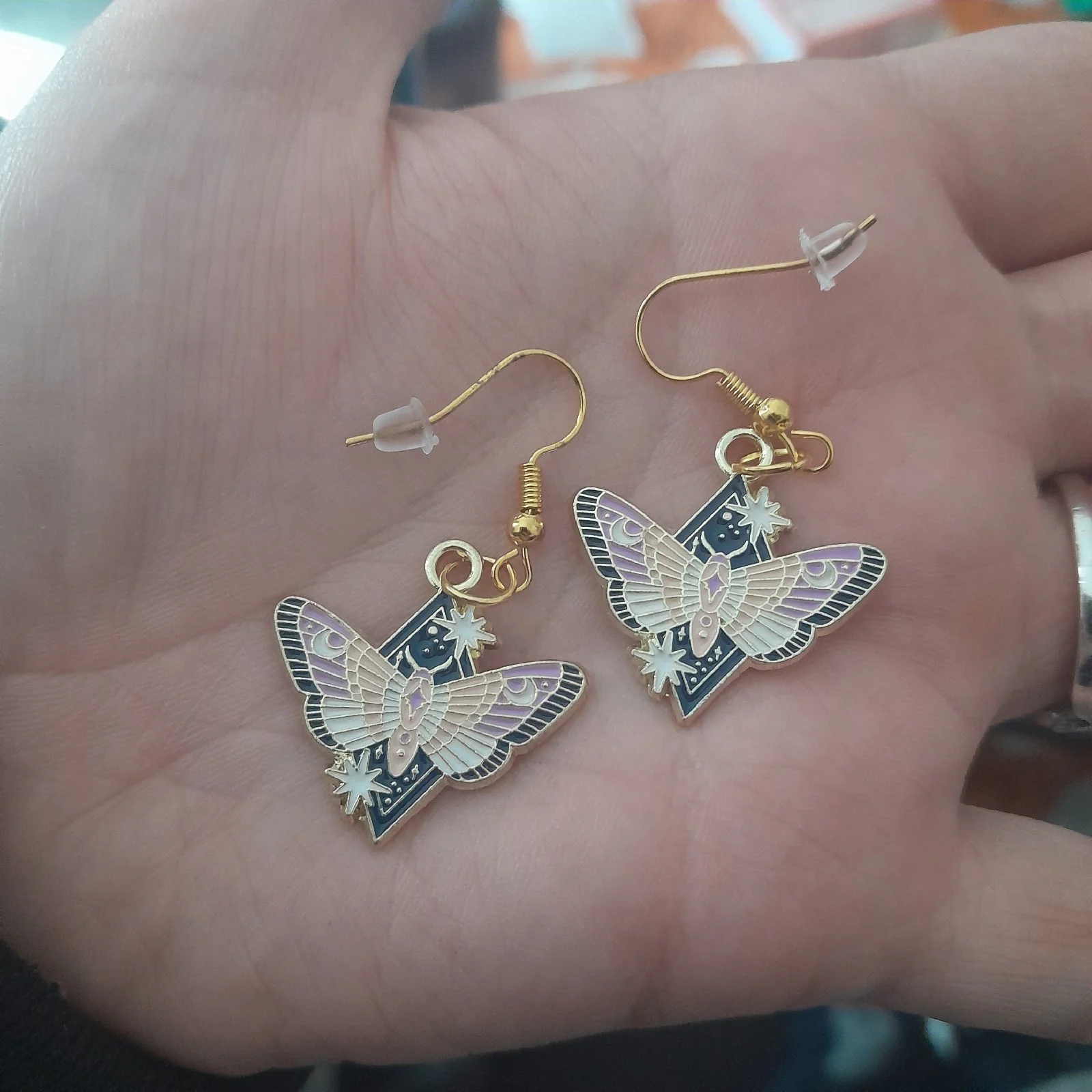 Gold moth earrings