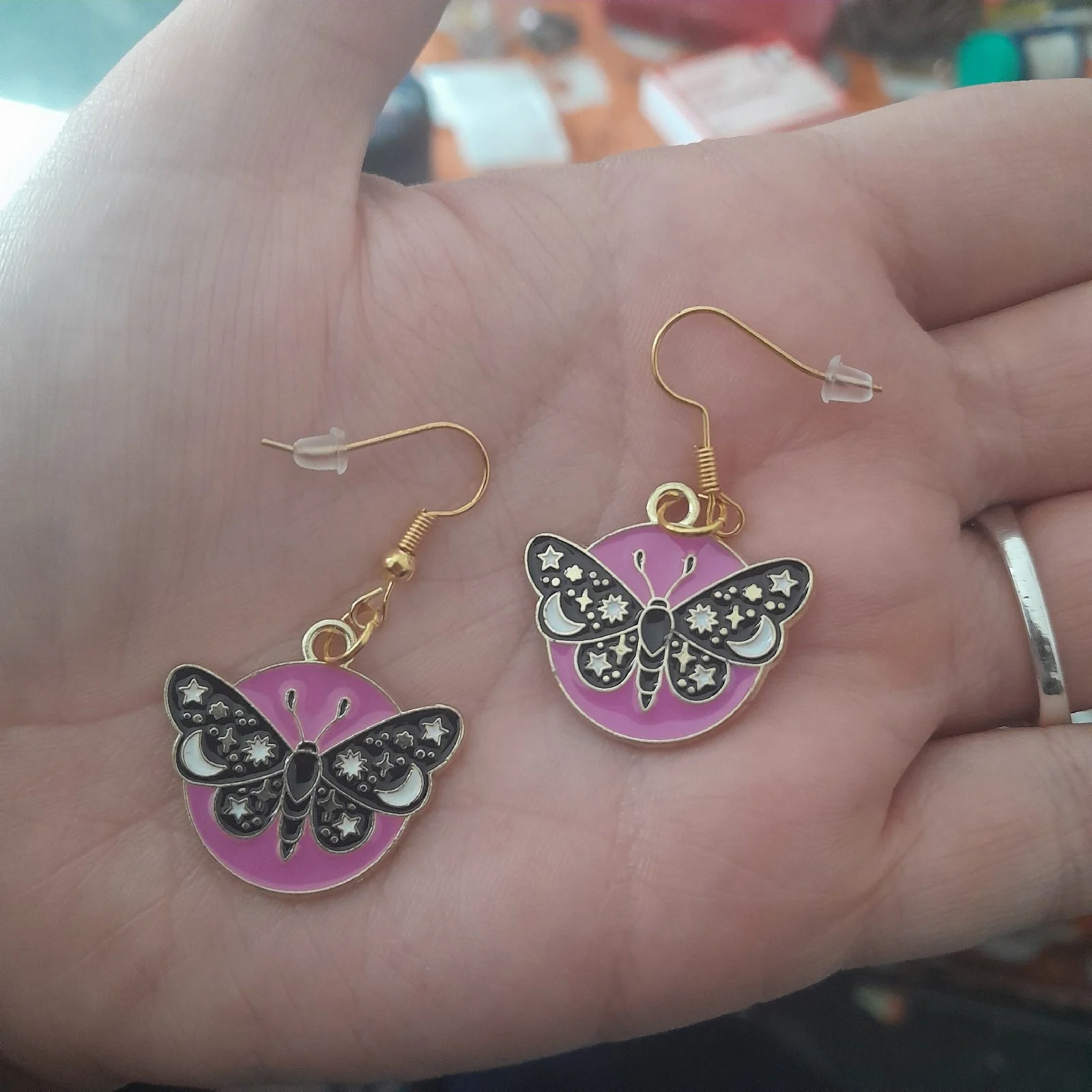 Pink and black butterfly gold earrings