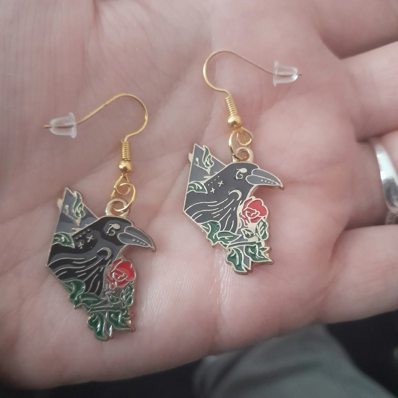 Gold hook raven on dimond earrings