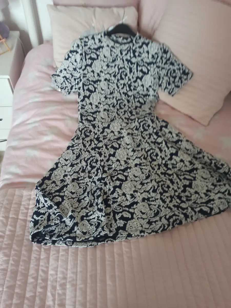Ladies blue and white embossed design dress