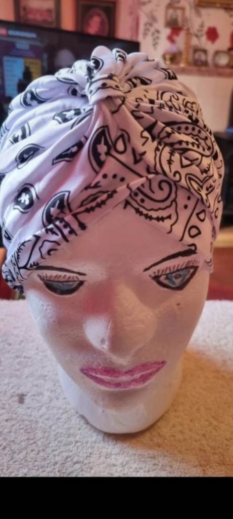 White and black print hats