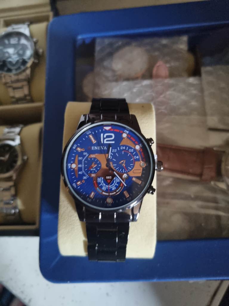 Mens blue and gold face watch
