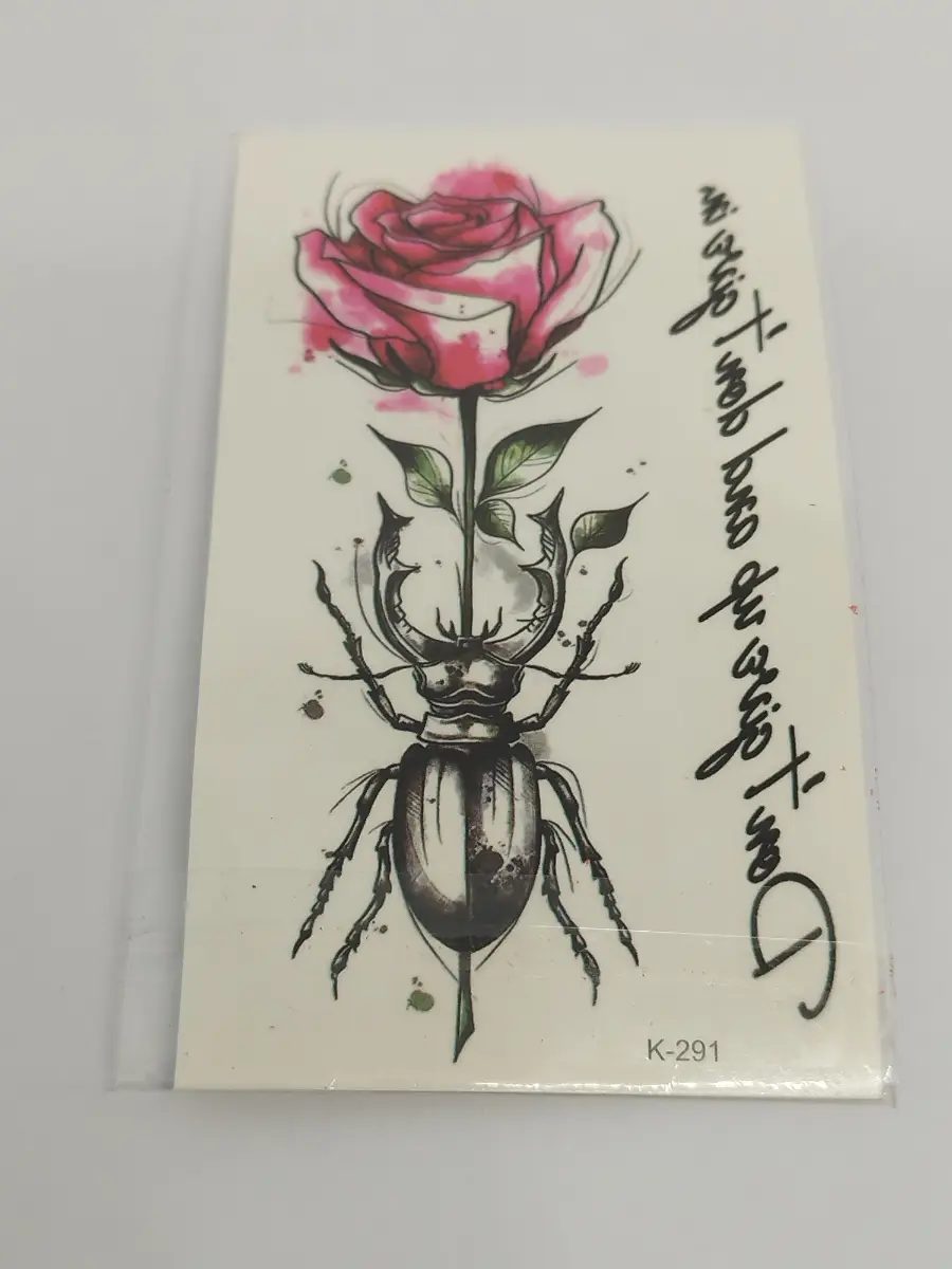 Heart & Beetle body tattoo