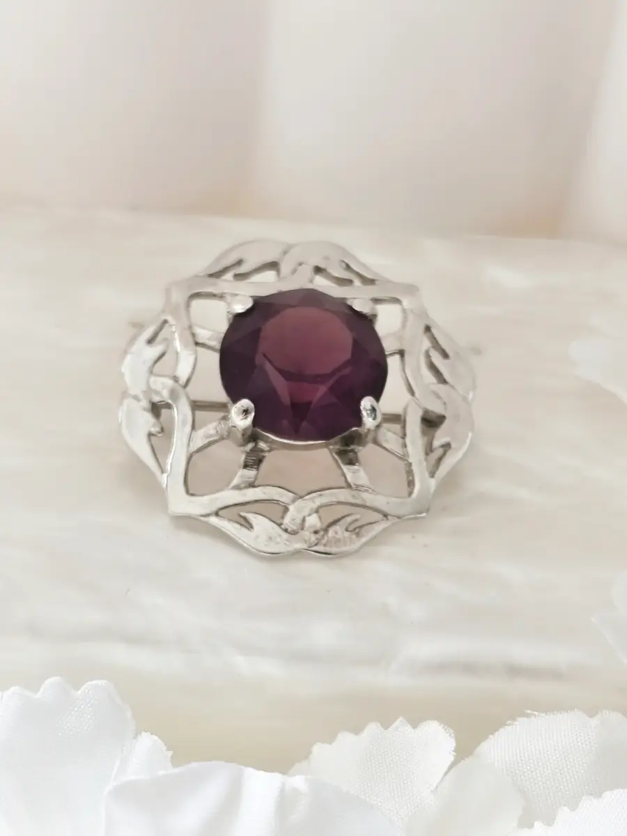 Silver tone & purple gem Celtic knot brooch