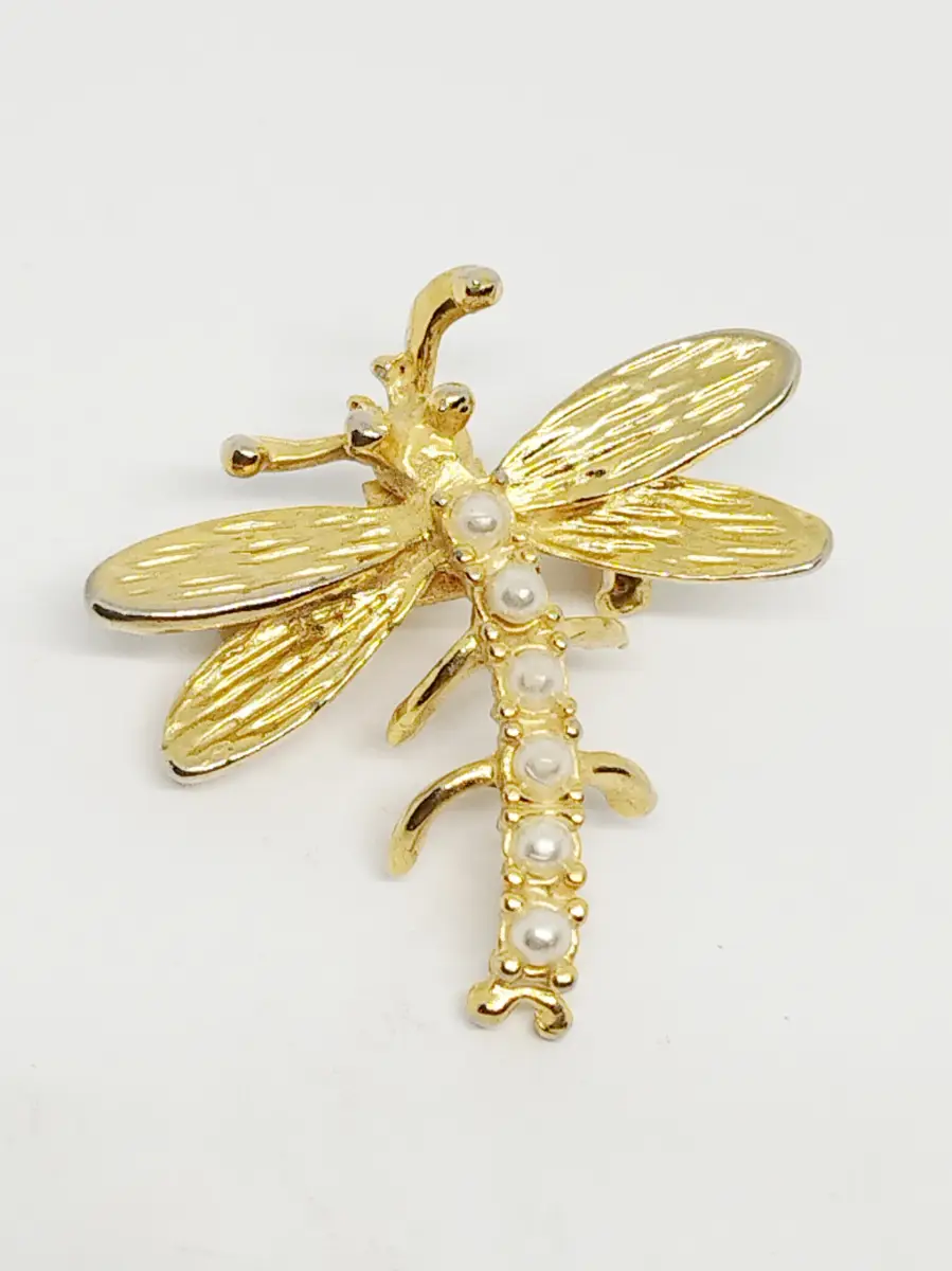 Gold tone dragonfly brooch with faux pearl beads