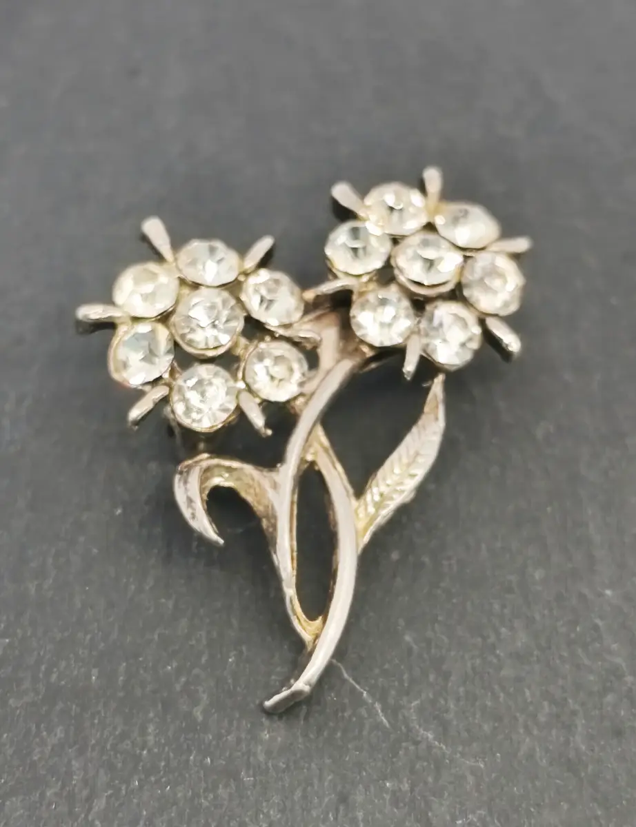 Vintage silver tone gem set flower brooch