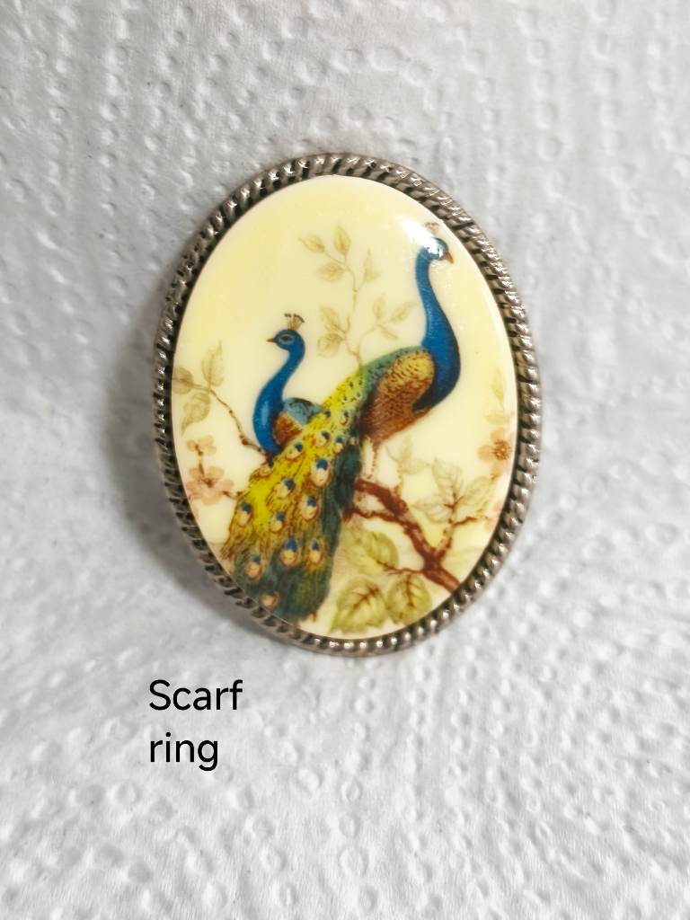 Scarf ring with peacock design