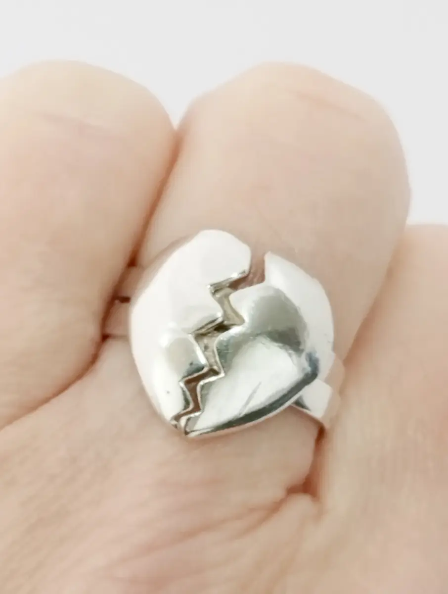 2 interlocking silver hallmarked 925 heart rings size O