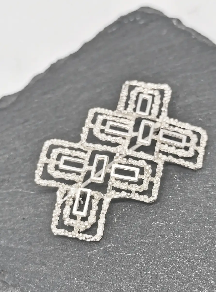 Geometric silver tone brooch